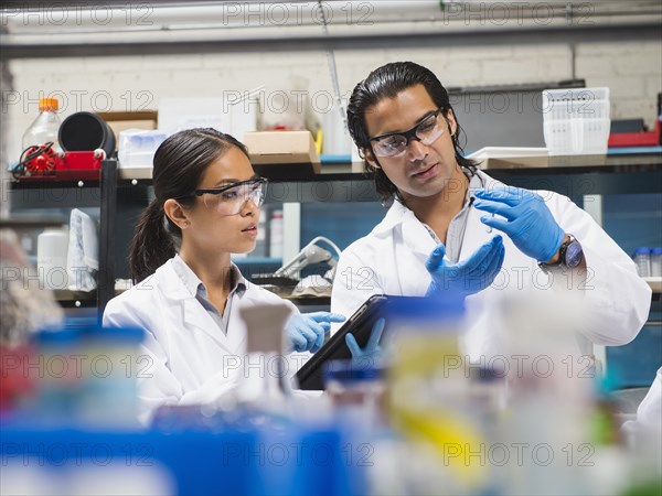 Scientists working in laboratory