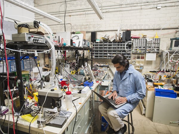 Indian scientist working in laboratory