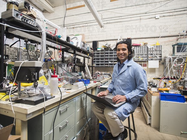 Indian scientist working in laboratory