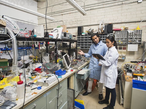 Scientists working in laboratory