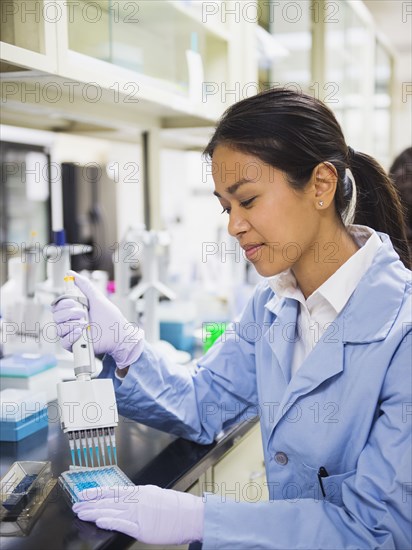 Japanese scientist working in laboratory