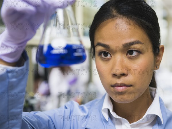 Japanese scientist working in laboratory