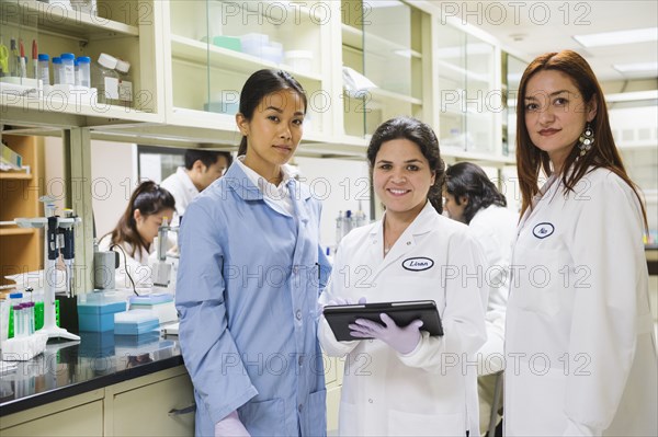 Scientists working in laboratory