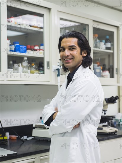 Indian scientist working in laboratory