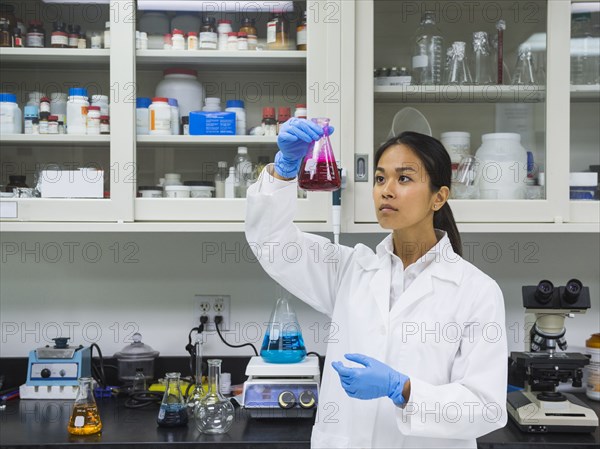 Japanese scientist working in laboratory