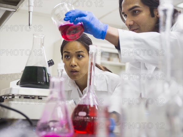 Scientists working in laboratory