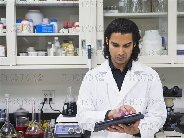 Indian scientist working in laboratory