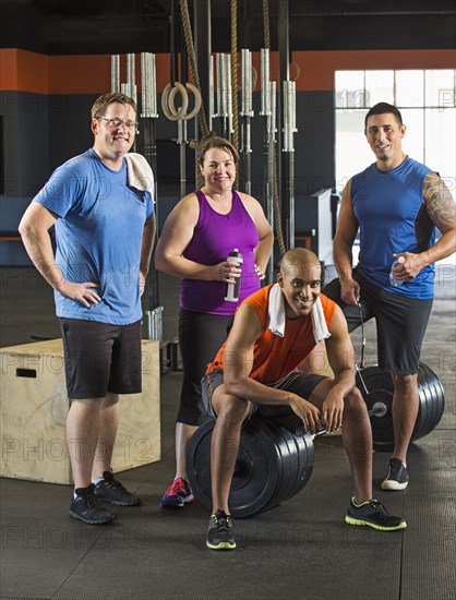 People resting together in gym