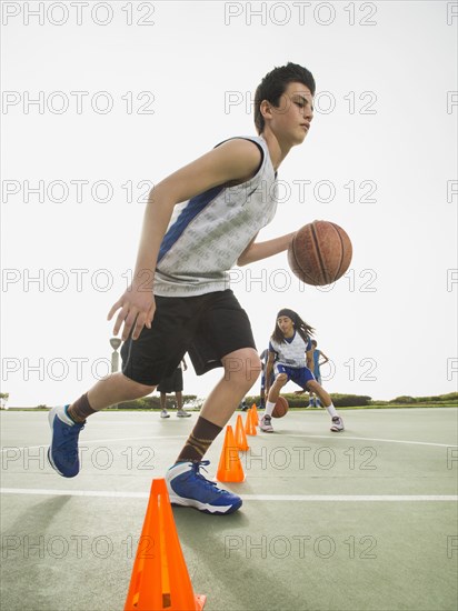 Basketball team doing drills at practice