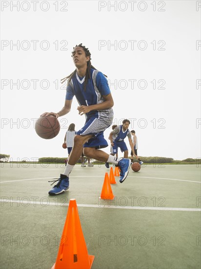 Basketball team doing drills at practice