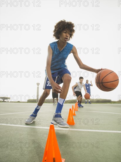 Basketball team doing drills at practice