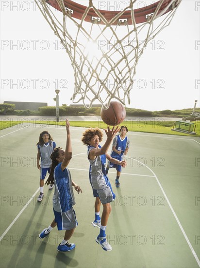 Basketball team doing drills at practice