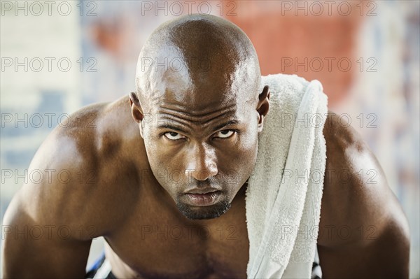 Black athlete doing push-ups