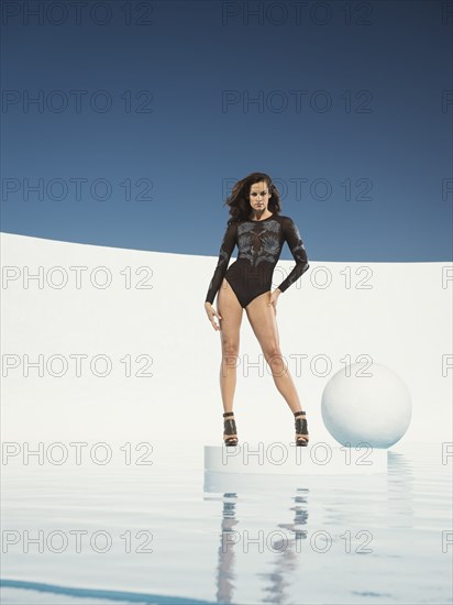 Caucasian woman standing on ice floe