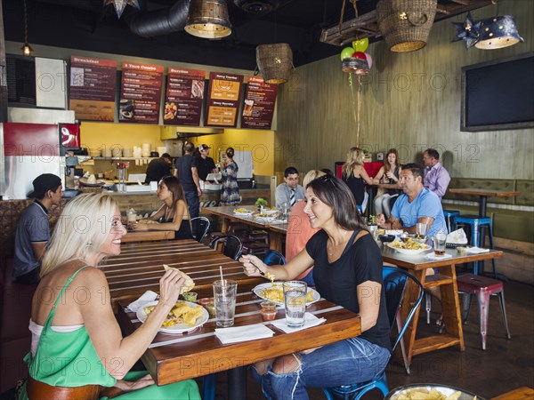 People eating in cafe