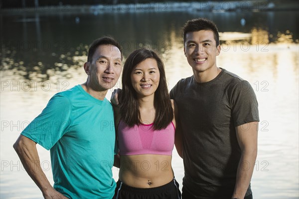 Chinese friends smiling in park