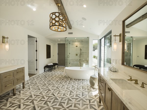 Sink and bathtub in luxury bathroom