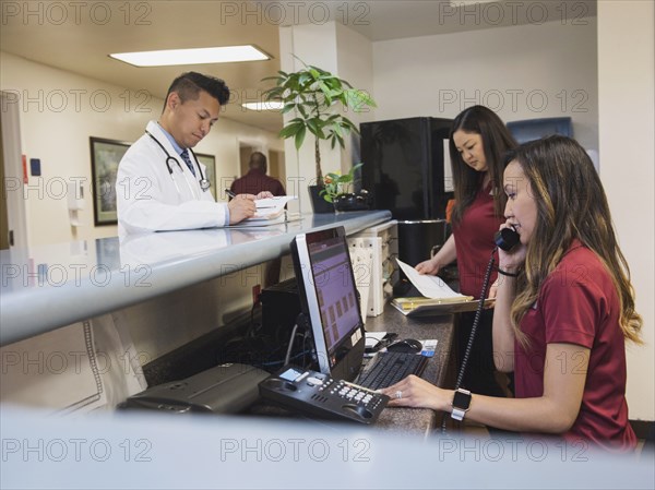 Busy nurses and doctor in hospital