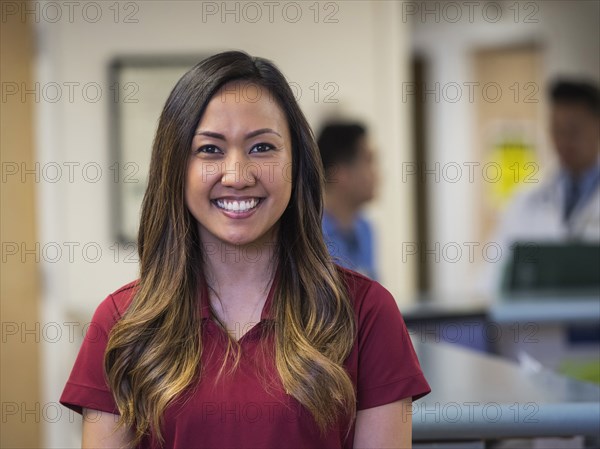 Portrait of smiling nurse in hospital