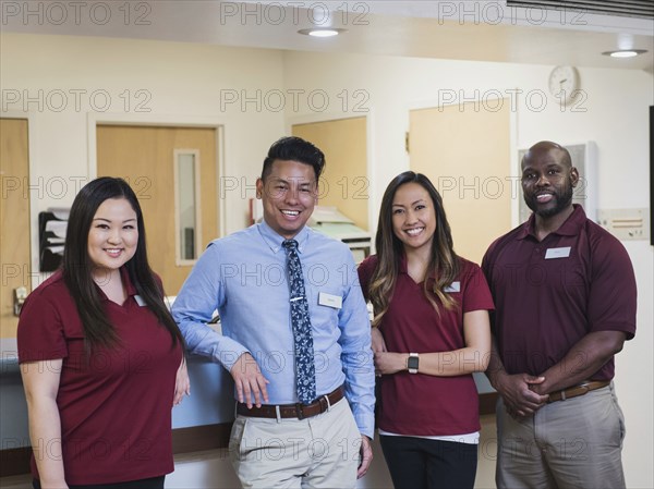 Portrait of smiling medical team in hospital