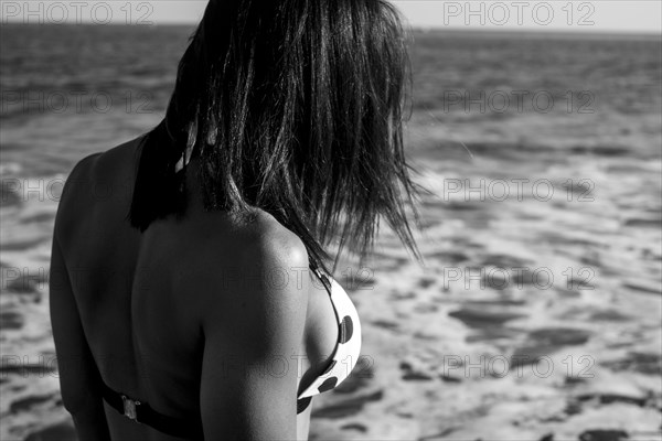 Close up of Caucasian woman wearing bikini on beach