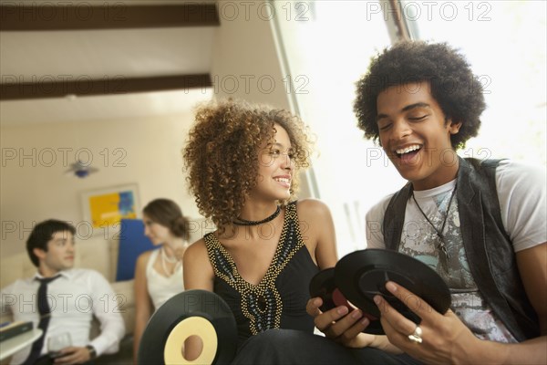 Couple looking at vinyl records