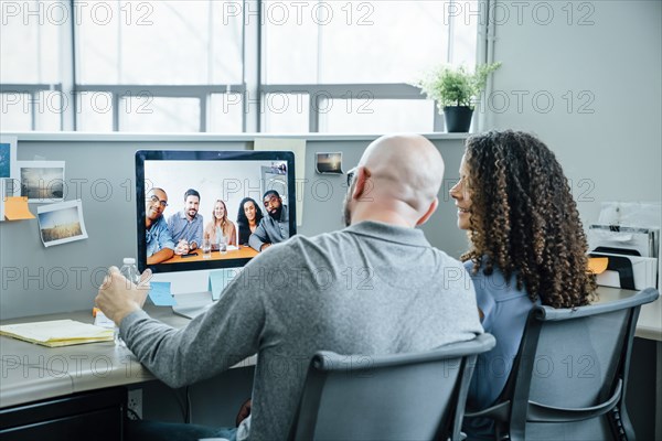 Business people on video conference