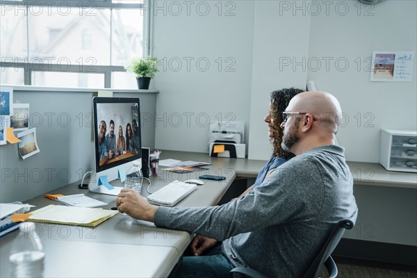 Business people on video conference