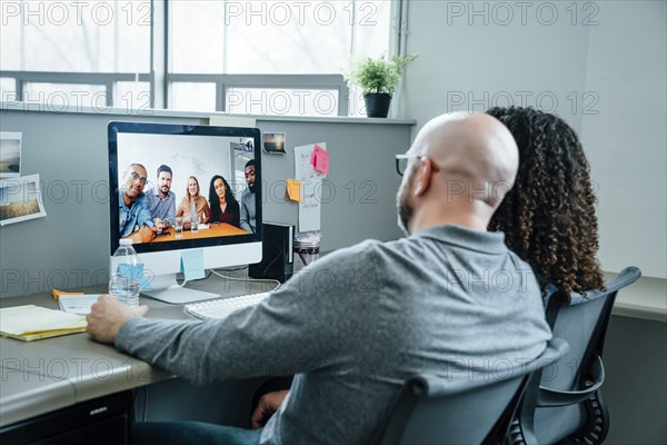 Business people on video conference