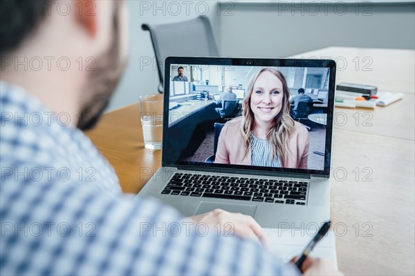 Business people on video conference