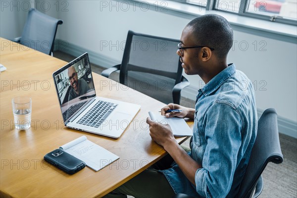 Business people on video conference