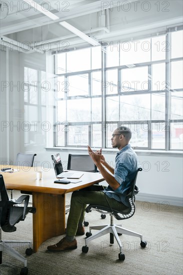 Black businessman on video conference