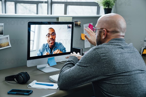 Businessmen on video conference