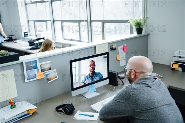 Businessmen on video conference