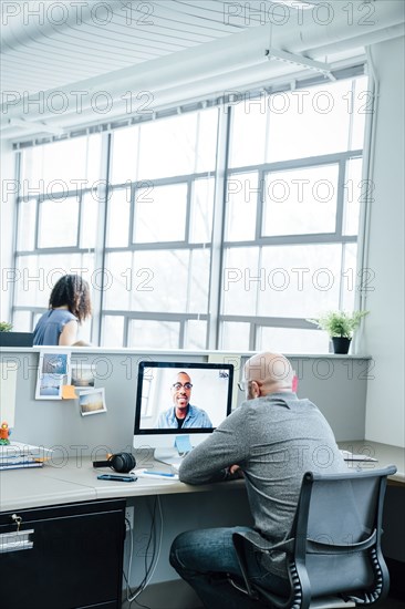 Businessmen on video conference