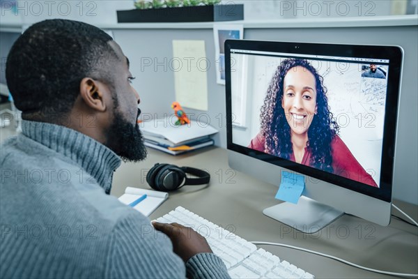 Business people on video conference