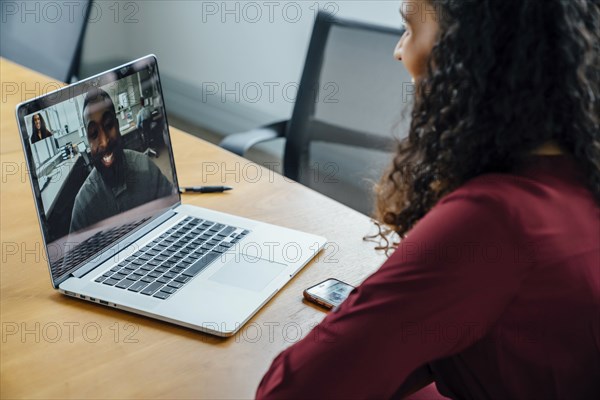 Business people on video conference