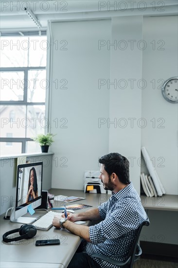 Business people on video conference