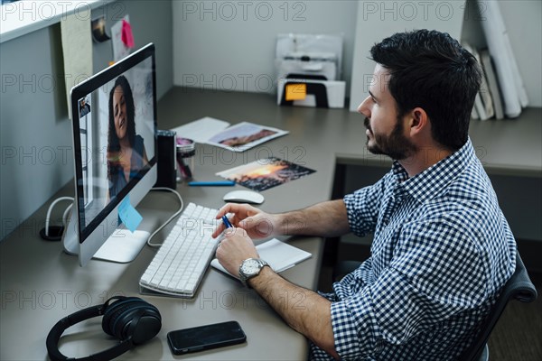 Business people on video conference