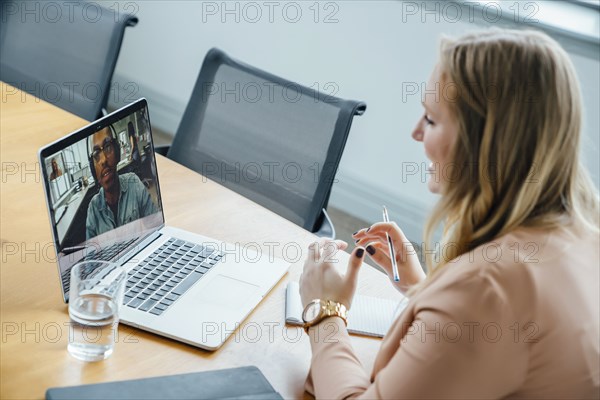 Business people on video conference