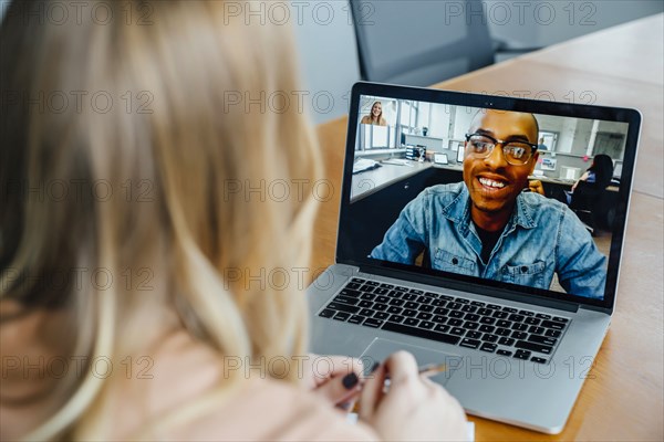 Business people on video conference