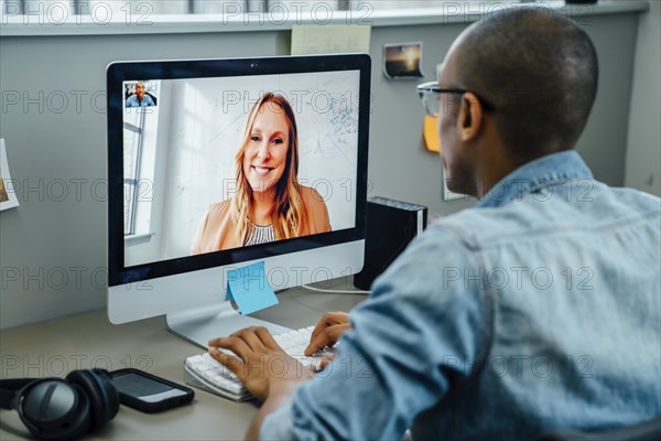 Business people on video conference