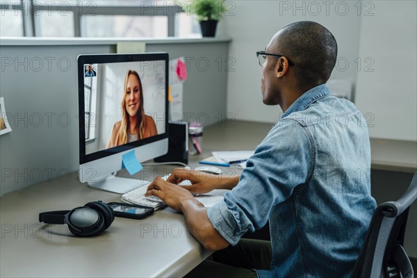 Business people on video conference