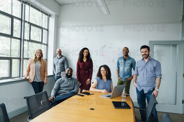 Portrait of diverse business people in conference room