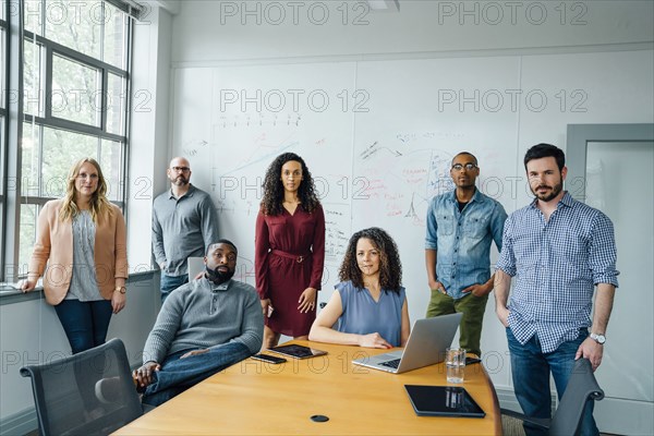 Portrait of diverse business people in conference room