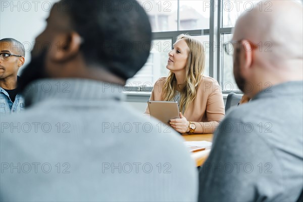 Business people listening in meeting