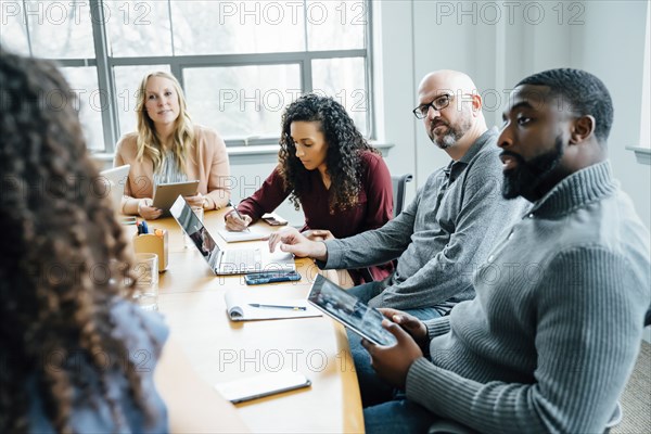 Business people listening in meeting