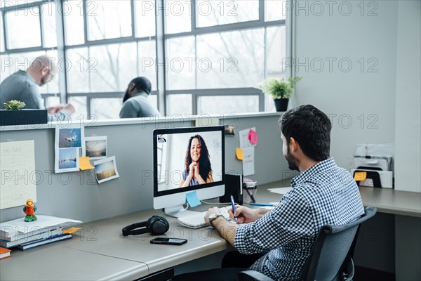 Business people on video conference