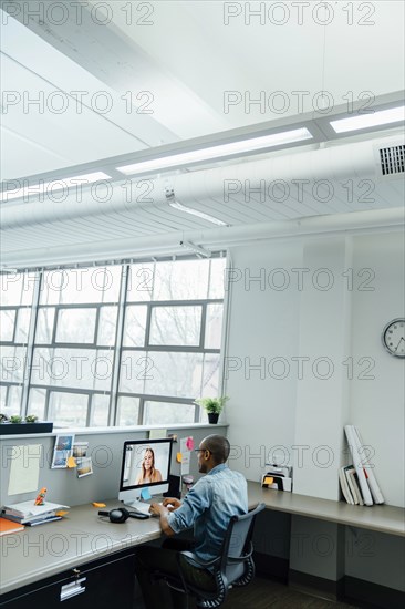 Business people on video conference