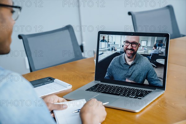 Businessmen on video conference